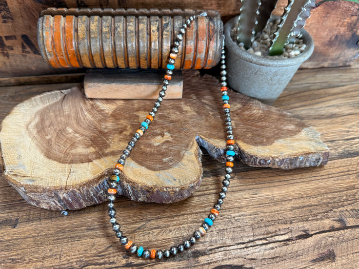 Sterling silver bead necklace with turquoise and orange beads, three-row look