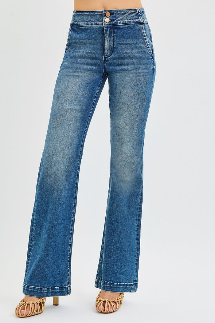 Women's light-wash denim jeans, front button closure and wide straight legs
