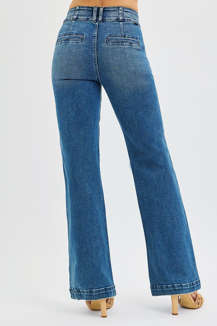Women's medium-wash denim jeans, back view with two back pockets