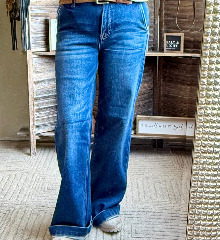 Medium-blue trouser jeans with straight legs, slant front pockets, and belt loops