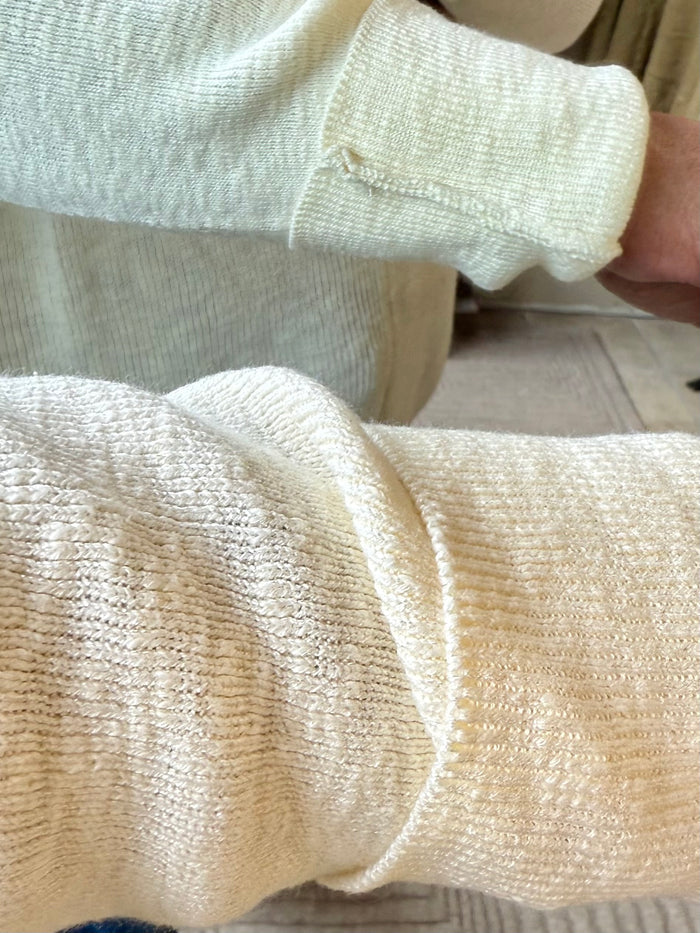 Cream textured knit oversized crew neck sweater with ribbed cuffs
